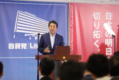 Japan PM visits flood-hit region, pledges financial support | Japan PM visits flood-hit region, pledges financial support