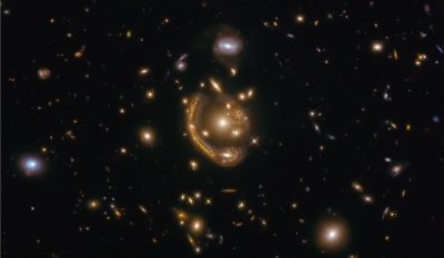 Hubble's new 'molten Einstein ring' image prompts new research | Hubble's new 'molten Einstein ring' image prompts new research