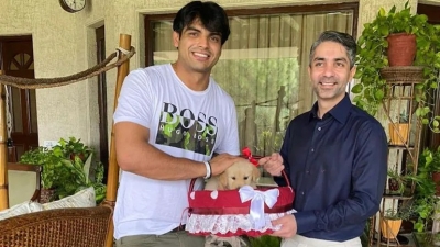 Neeraj gets puppy named 'Tokyo' as a gift from Bindra | Neeraj gets puppy named 'Tokyo' as a gift from Bindra