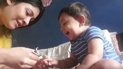 'KGF' star Yash's toddler son giggles during nail trim from mom Radhika; video goes viral | 'KGF' star Yash's toddler son giggles during nail trim from mom Radhika; video goes viral