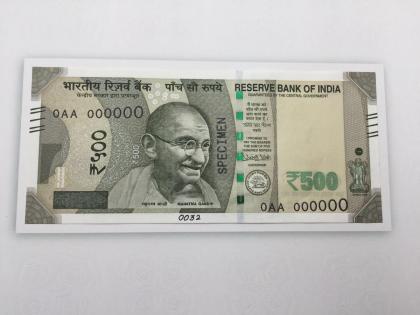 UP cop faces probe after family takes selfie with currency notes | UP cop faces probe after family takes selfie with currency notes