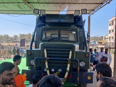 Pawan Kalyan performs puja of his campaign vehicle at T'gana temple | Pawan Kalyan performs puja of his campaign vehicle at T'gana temple