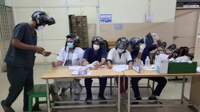 Junior doctors at Hyderabad's Osmania Hospital wear helmets | Junior doctors at Hyderabad's Osmania Hospital wear helmets