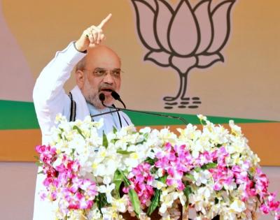 Amit Shah takes jibe at Cong over Rajiv Gandhi Foundation's FCRA registration cancellation | Amit Shah takes jibe at Cong over Rajiv Gandhi Foundation's FCRA registration cancellation