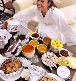 Rashmika Mandanna is all things happy as she hogs on Delhi food! | Rashmika Mandanna is all things happy as she hogs on Delhi food!