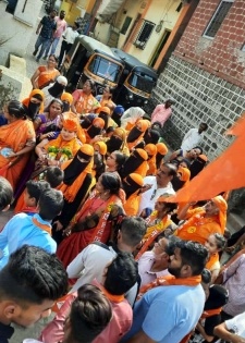 Row of saffron hijabs herald Shiv Sena's 'maiden' Muslim Sarpanch | Row of saffron hijabs herald Shiv Sena's 'maiden' Muslim Sarpanch