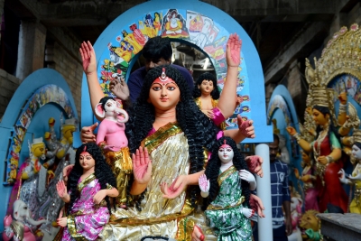 Corona is the new Mahishasura in Delhi's subdued Durga Puja | Corona is the new Mahishasura in Delhi's subdued Durga Puja