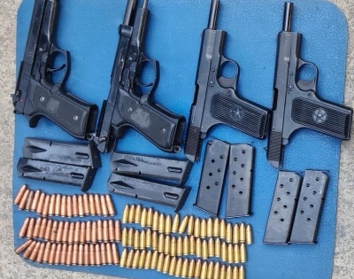 4 pistols, ammunition recovered in J&K's Pulwama | 4 pistols, ammunition recovered in J&K's Pulwama