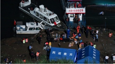 8 killed, 7 missing after passenger boat overturns in China | 8 killed, 7 missing after passenger boat overturns in China