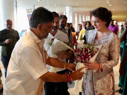 Rahul, Priyanka arrive in B'luru for swearing-in ceremony | Rahul, Priyanka arrive in B'luru for swearing-in ceremony