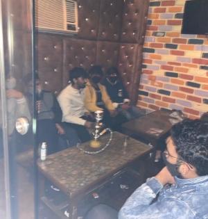 Two hookah bars busted in Delhi's Rohini, 65 held | Two hookah bars busted in Delhi's Rohini, 65 held Two hookah bars busted in Delhi's Rohini, 65 held | Two hookah bars busted in Delhi's Rohini, 65 held