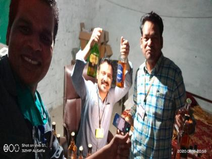 Three Madhya Pradesh officials suspended for pic with liquor bottles | Three Madhya Pradesh officials suspended for pic with liquor bottles
