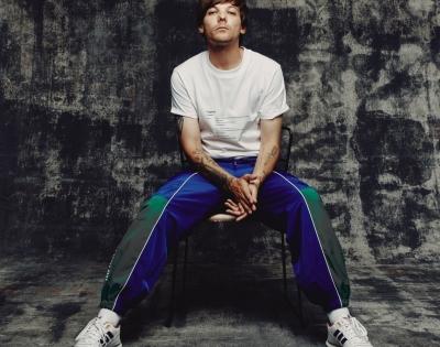 Louis Tomlinson says One Direction's first album was 's**t' | Louis Tomlinson says One Direction's first album was 's**t'