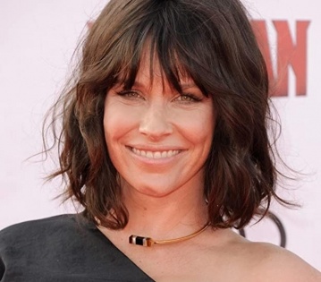 Evangeline Lilly longs to fondle King Charles' ear lobes | Evangeline Lilly longs to fondle King Charles' ear lobes