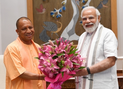 Yogi meets PM Modi, discusses new UP cabinet | Yogi meets PM Modi, discusses new UP cabinet