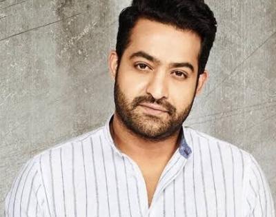 NTR Jr. raises intrigue with title glimpse in Sai Dharam Tej's 15th movie 'Virupaksha' | NTR Jr. raises intrigue with title glimpse in Sai Dharam Tej's 15th movie 'Virupaksha'