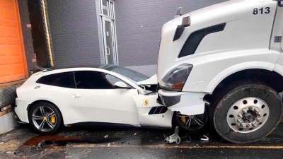 Fired from job, employee rams Volvo truck into boss's Ferrari | Fired from job, employee rams Volvo truck into boss's Ferrari