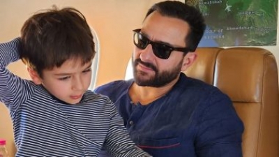 Taimur poses with father Saif in new aeroplane pics | Taimur poses with father Saif in new aeroplane pics