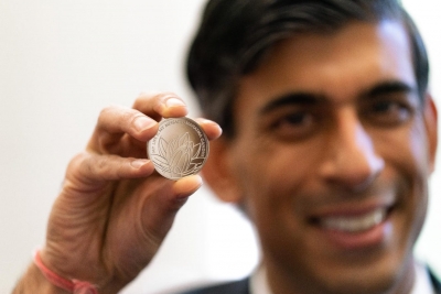 UK unveils coin on Mahatma to mark Diwali | UK unveils coin on Mahatma to mark Diwali
