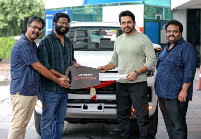 'Sardar' producer gifts director Mithran a new car | 'Sardar' producer gifts director Mithran a new car