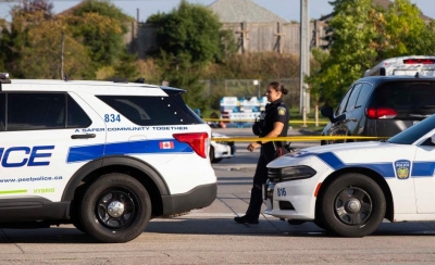Canadian police officer shot dead, suspect in custody | Canadian police officer shot dead, suspect in custody