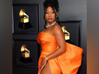 Megan Thee Stallion stuns in orange gown at 2021 Grammys | Megan Thee Stallion stuns in orange gown at 2021 Grammys