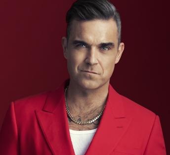 Robbie Williams considers wearing bra on stage | Robbie Williams considers wearing bra on stage