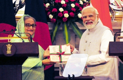 India, Bangladesh ink seven pacts | India, Bangladesh ink seven pacts