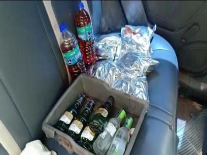 Man held for trying to carry liquor, non-veg food to Tirumala | Man held for trying to carry liquor, non-veg food to Tirumala