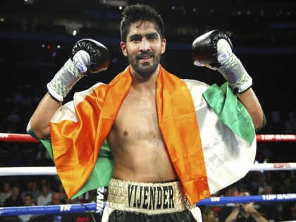 Vijender Singh returns to winning ways in pro boxing after knocking out Ghana's Eliasu Sulley | Vijender Singh returns to winning ways in pro boxing after knocking out Ghana's Eliasu Sulley