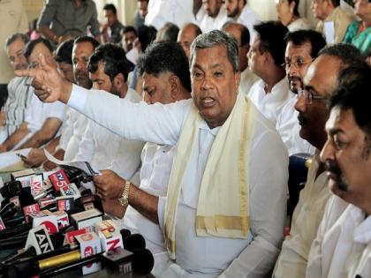 BJP workers protest against Siddaramaiah's remark on Savarkar, Congress leader warns of action after regaining power | BJP workers protest against Siddaramaiah's remark on Savarkar, Congress leader warns of action after regaining power