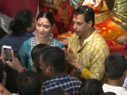 Tamannaah Bhatia offers prayer with filmmaker Madhur Bhandarkar at Mumbai's Lalbaugcha Raja Ganesh Mandal | Tamannaah Bhatia offers prayer with filmmaker Madhur Bhandarkar at Mumbai's Lalbaugcha Raja Ganesh Mandal