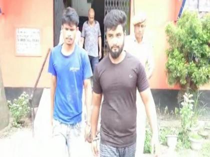 Assam: Locals catch 2 robbers with arms, hand them over to police | Assam: Locals catch 2 robbers with arms, hand them over to police