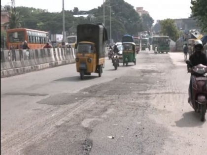 Bengaluru woman dies after being hit by bus while trying to avoid pothole | Bengaluru woman dies after being hit by bus while trying to avoid pothole