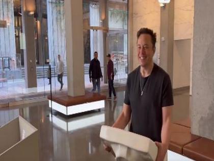 "Let that sink in," says Musk as he strolls into Twitter HQ ahead of expected deal closing | "Let that sink in," says Musk as he strolls into Twitter HQ ahead of expected deal closing