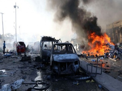 2 car bomb explosions near Somalia's education ministry kill 100 people | 2 car bomb explosions near Somalia's education ministry kill 100 people