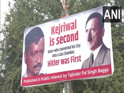 Poster comparing Kejriwal to Adolf Hitler put up outside BJP headquarters in Delhi | Poster comparing Kejriwal to Adolf Hitler put up outside BJP headquarters in Delhi
