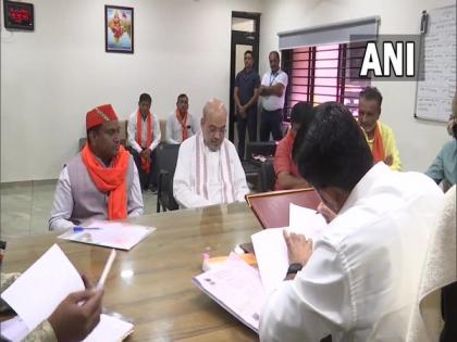 BJP's Sanand constituency candidate files nomination for Gujarat polls with Amit Shah | BJP's Sanand constituency candidate files nomination for Gujarat polls with Amit Shah