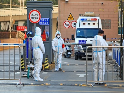 China announces first COVID death since May as cases spike in Beijing | China announces first COVID death since May as cases spike in Beijing