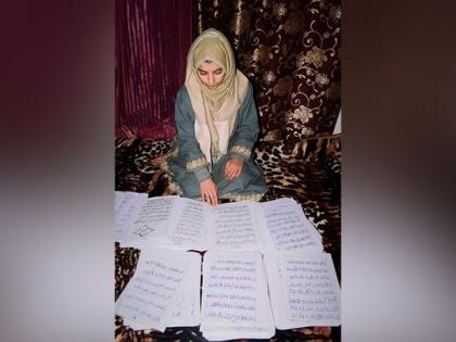 School student in J-K's Bandipora writes 900-page Quran with hands | School student in J-K's Bandipora writes 900-page Quran with hands