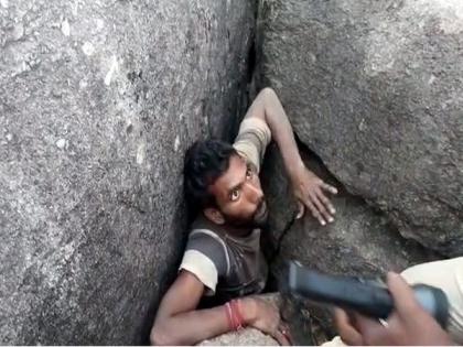Man stuck between two boulders in Telangana rescued | Man stuck between two boulders in Telangana rescued
