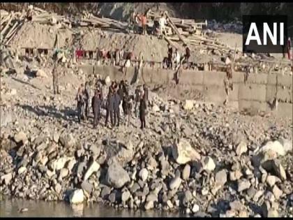Stone pelting incident reported from Nepal's side on embankment work in Dharchula | Stone pelting incident reported from Nepal's side on embankment work in Dharchula Stone pelting incident reported from Nepal's side on embankment work in Dharchula | Stone pelting incident reported from Nepal's side on embankment work in Dharchula