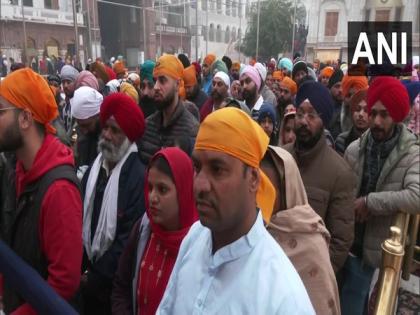 Devotees offer prayers at Golden temple in Amritsar on Guru Gobind Singh Jayanti | Devotees offer prayers at Golden temple in Amritsar on Guru Gobind Singh Jayanti