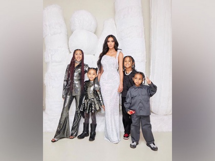 Kim Kardashian poses for quirky snaps with kids, check out pics | Kim Kardashian poses for quirky snaps with kids, check out pics