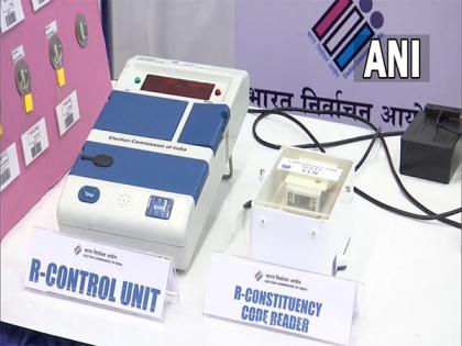 EC showcases remote EVM to political party representatives | EC showcases remote EVM to political party representatives EC showcases remote EVM to political party representatives | EC showcases remote EVM to political party representatives