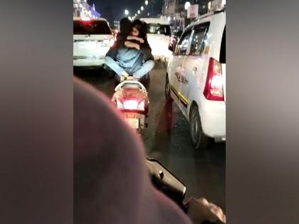 UP: Viral Video shows duo hugging while riding 2-wheeler in Hazratganj; probe on | UP: Viral Video shows duo hugging while riding 2-wheeler in Hazratganj; probe on UP: Viral Video shows duo hugging while riding 2-wheeler in Hazratganj; probe on | UP: Viral Video shows duo hugging while riding 2-wheeler in Hazratganj; probe on