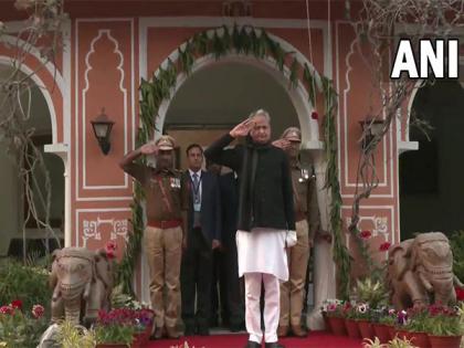 Rajasthan CM Gehlot unfurls national flag at his residence | Rajasthan CM Gehlot unfurls national flag at his residence