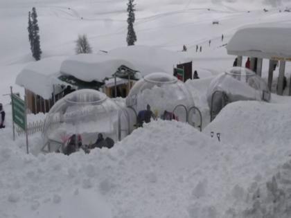 J-K: Tourists flock to 'Glass Igloo' in middle of snow in Gulmarg | J-K: Tourists flock to 'Glass Igloo' in middle of snow in Gulmarg