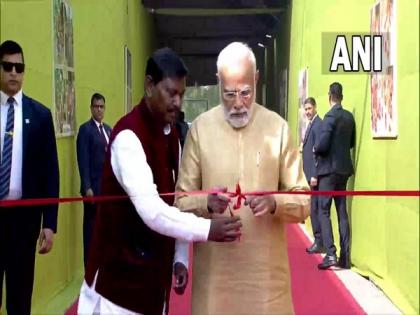 PM Modi inaugurates "Aadi Mahotsav" to showcase tribal culture, pays tribute to freedom fighter Birsa Munda | PM Modi inaugurates "Aadi Mahotsav" to showcase tribal culture, pays tribute to freedom fighter Birsa Munda