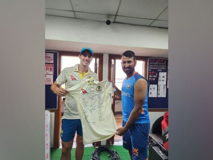 Australia captain Pat Cummins gifts signed team jersey to Cheteshwar Pujara for completing 100 Tests | Australia captain Pat Cummins gifts signed team jersey to Cheteshwar Pujara for completing 100 Tests